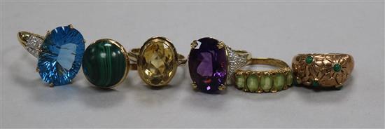 Six assorted 9ct gold and gem set rings including citrine and malachite.